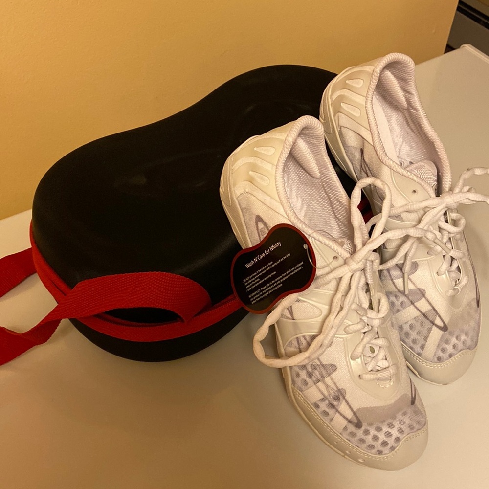 Infinity cheerleading shoes brand new with tag and case, never worn!